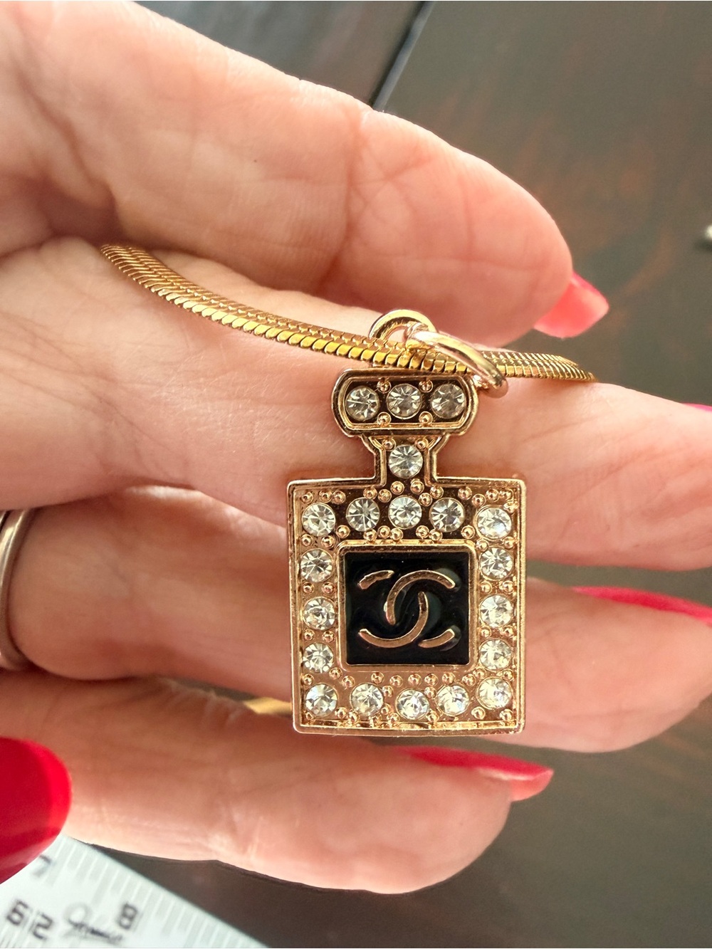 Chanel Perfume Bottle pull, stamped,
On 22” stainless tarnish resistant chain.